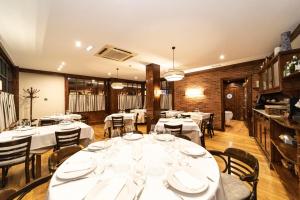 Restoranas ar kita vieta pavalgyti apgyvendinimo įstaigoje Hotel Restaurante De Torres