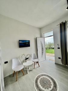 Sjónvarps- og/eða afþreyingartæki á Iart Residence