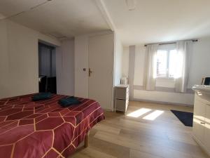 Posteľ alebo postele v izbe v ubytovaní Logement 2 pièces Au Relais Normand