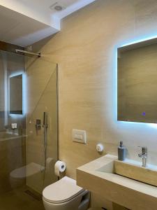 Koupelna v ubytování Solea Hotel