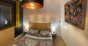 Llit o llits en una habitació de Le Tremplin