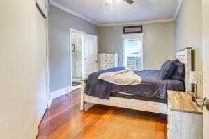 a bedroom with a bed and a wooden floor at Serene Kings Mountain Home Near 2 Kings Casino! in Kings Mountain