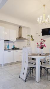 Η κουζίνα ή μικρή κουζίνα στο Sea view apartments in Villa Esperia