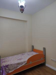 Postel nebo postele na pokoji v ubytování SERASKER KADIKÖY ISTANBUL