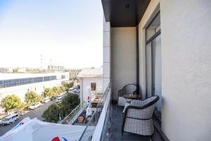 En balkon eller terrasse på PREMIER HOTEL