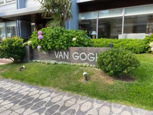 a sign that says van gogh in front of a building at Apartamento Van Gogh Dpto 306 in Punta del Este