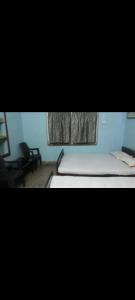 Postel nebo postele na pokoji v ubytování Aleyahome stay