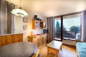 Η κουζίνα ή μικρή κουζίνα στο Appartement 2 Pièces - Les Saisies