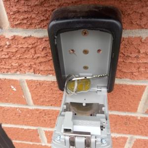 a light on the side of a brick wall at Jolly Piece in Castleford