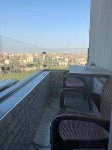 Balkón nebo terasa v ubytování pyramids grand museum inn