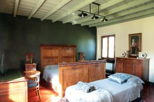 Postel nebo postele na pokoji v ubytování Villa Lucini 1886 "La Dolcevita" Cottage 2, close to Lake Como and Milan + 37 fotografií