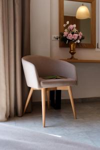 A seating area at Aphrodite Hotel