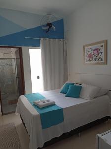 Cama ou camas em um quarto em Pousada Antares