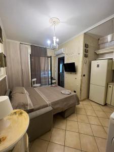 TV a/nebo společenská místnost v ubytování Civico 12 - casa vacanze