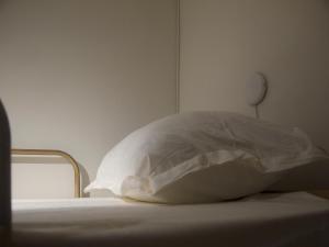 Letto o letti in una camera di Friends Hostel
