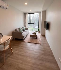 TV a/nebo společenská místnost v ubytování Sky Park Laguna 1bdr Lake View + 16 fotografií