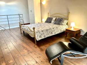 Postel nebo postele na pokoji v ubytování La Corte di Saronno