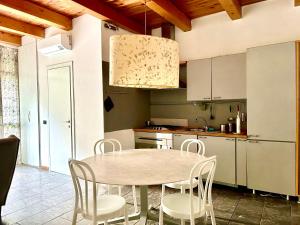 Kuchyň nebo kuchyňský kout v ubytování La Corte di Saronno + 9 fotografií