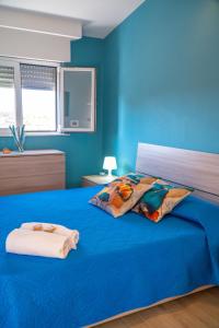 Ein Bett oder Betten in einem Zimmer der Unterkunft Acacia House - Few meters from the beach