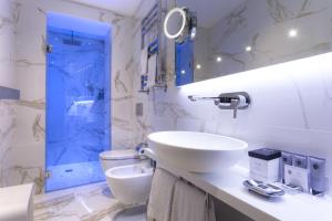 Koupelna v ubytování Hotel Spadai