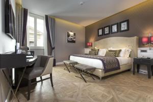 Postel nebo postele na pokoji v ubytování Hotel Spadai