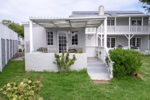 Un jardín fuera de Seaside Cottage Kommetjie