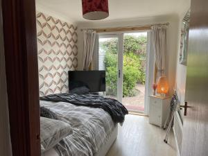 Postel nebo postele na pokoji v ubytování 3Bed House - Family Friendly - Close To LochNess