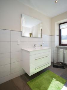 Koupelna v ubytování Ferienhaus an der Austwies + 21 fotografií