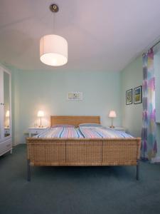 Ferienhaus an der Austwies tesisinde bir odada yatak veya yataklar