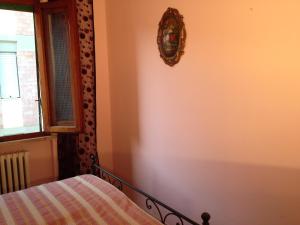 Postel nebo postele na pokoji v ubytování Stanza Bellaria