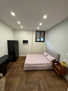 Postel nebo postele na pokoji v ubytování San Domenico Apartment