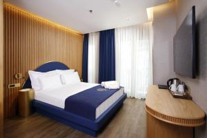 Postel nebo postele na pokoji v ubytování Kate Hotel Special Class & SPA