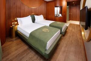 Postel nebo postele na pokoji v ubytování Kate Hotel Special Class & SPA