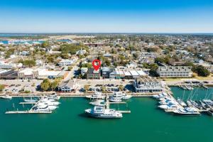 an aerial view of a marina with boats in the water at Why Knot Getaway…Rooftop with WaterView! Unit F in Beaufort