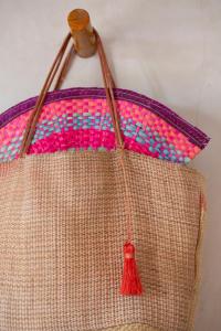 a close up of a purse with a red tassel at Hotel Boutique Can Cocal El Cuyo in El Cuyo