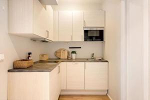 Kjøkken eller kjøkkenkrok på Praktisk 1-Roms leilighet
