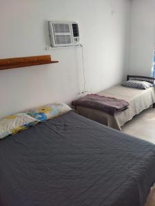 Postel nebo postele na pokoji v ubytování Alojamiento Temporarios NEA