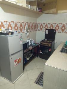 Dapur atau dapur kecil di Malaika Comfort Homes