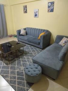 Ruang duduk di Malaika Comfort Homes