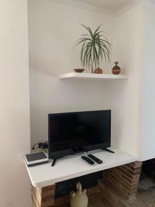 TV a/nebo společenská místnost v ubytování Villa Canamon