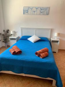 Postel nebo postele na pokoji v ubytování Villa Canamon