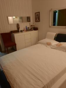 Ein Bett oder Betten in einem Zimmer der Unterkunft Nada apartman
