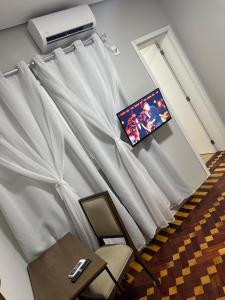TV a/nebo společenská místnost v ubytování Hotel Dom Marechal neoclássico