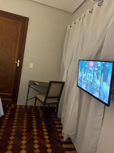 TV a/nebo společenská místnost v ubytování Hotel Dom Marechal neoclássico