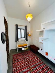 Postel nebo postele na pokoji v ubytování Riad Dar Sebta
