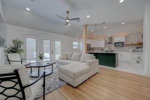 a living room with a couch and a table at Stylish, 2 Bedroom in Houston-Bellaire in Houston