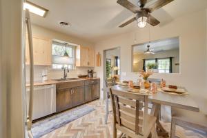 a kitchen with a table and a counter top at Charming Clarkdale Home - Half Mi to Downtown! in Clarkdale