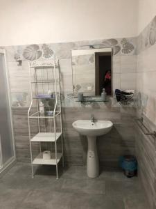Ett badrum på Il grappolo -affittacamere-