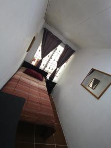 Postel nebo postele na pokoji v ubytování Casa Kitus