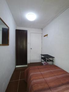 Postel nebo postele na pokoji v ubytování Casa Kitus